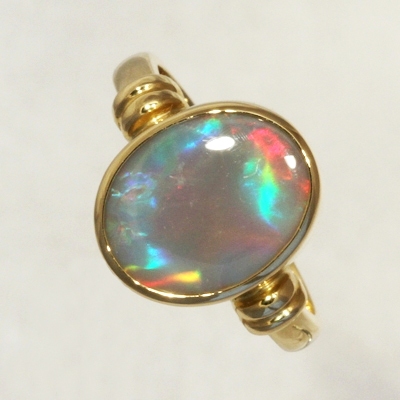 CUSTOM MADE 18k Yellow Gold Ring with a SOLID SEMI BLACK OPAL Large rolling flashes of bright red turning to peacock blue with a touch of green and purple